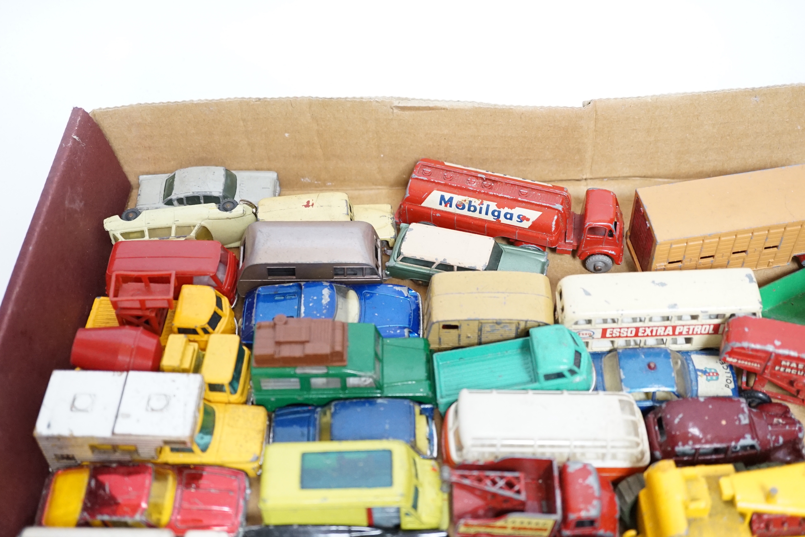 A collection of diecast vehicles by Corgi Toys, Dinky, Spot-On, Matchbox, etc. including 38, corgi toys; a Batmobile, a gold James Bond Aston Martin, a Man From UNCLE Oldsmobile, etc. 18 Husky Toys, ten Dinky Toys, etc.